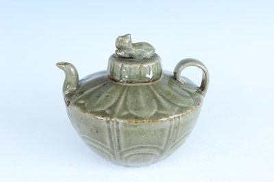 Lot 103 - A Chinese Longquan-type celadon teapot, in...
