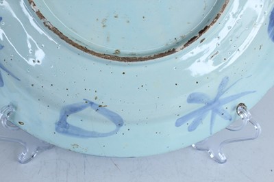 Lot 25 - A Dutch Delft dish in Chinese Wanli style,...