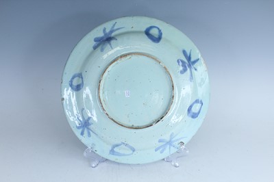 Lot 25 - A Dutch Delft dish in Chinese Wanli style,...