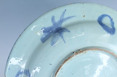 Lot 25 - A Dutch Delft dish in Chinese Wanli style,...