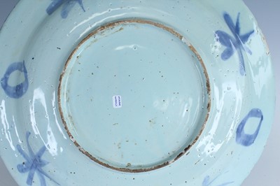 Lot 25 - A Dutch Delft dish in Chinese Wanli style,...