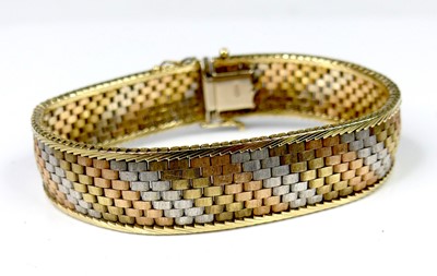 Lot 2558 - A modern 9ct three-colour gold meshlink...