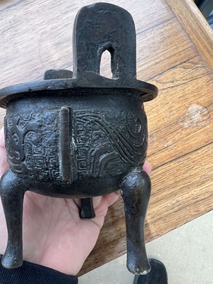 Lot 69 - Two Chinese bronze tripod censers, Qing...