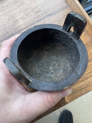 Lot 69 - Two Chinese bronze tripod censers, Qing...