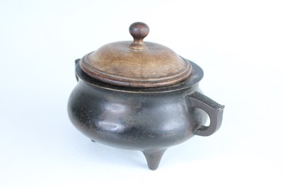 Lot 69 - Two Chinese bronze tripod censers, Qing...