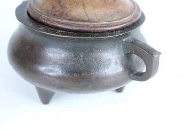 Lot 69 - Two Chinese bronze tripod censers, Qing...
