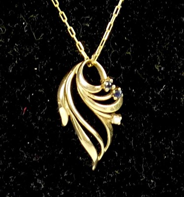 Lot 2574 - A modern 9ct gold sapphire and single seed...