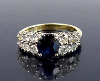 Lot 2563 - An 18ct yellow and white gold, sapphire and...
