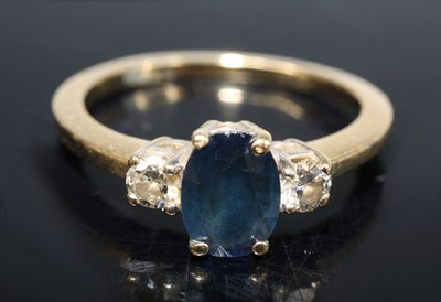 Lot 2679 - An 18ct gold sapphire and diamond three-stone...