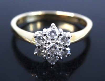 Lot 2617 - An 18ct yellow and white gold diamond circular...