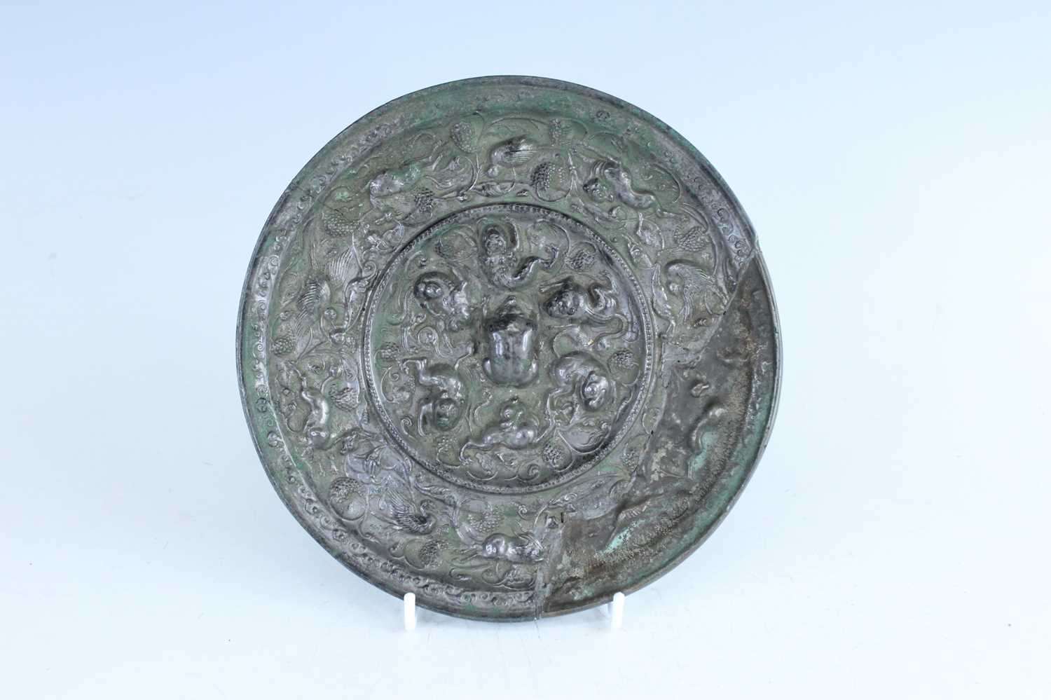 Lot 68 - A Chinese bronze ‘sea creatures and grapevine’...