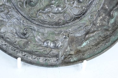 Lot 68 - A Chinese bronze ‘sea creatures and grapevine’...