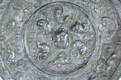 Lot 68 - A Chinese bronze ‘sea creatures and grapevine’...