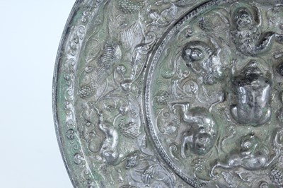 Lot 68 - A Chinese bronze ‘sea creatures and grapevine’...