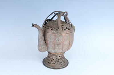 Lot 260 - A Kashmir brass teapot with central brazier,...