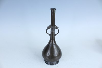 Lot 61 - Three Oriental metal items, 19th–20th century...