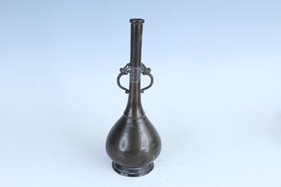 Lot 61 - Three Oriental metal items, 19th–20th century...