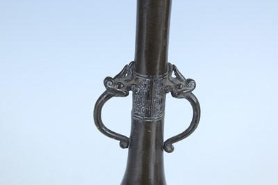 Lot 61 - Three Oriental metal items, 19th–20th century...