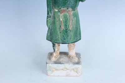 Lot 127 - A Chinese sancai-glazed pottery figure of a...