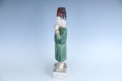 Lot 127 - A Chinese sancai-glazed pottery figure of a...