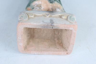 Lot 127 - A Chinese sancai-glazed pottery figure of a...