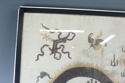 Lot 139 - A Chinese embroidered dragon panel, 20th...