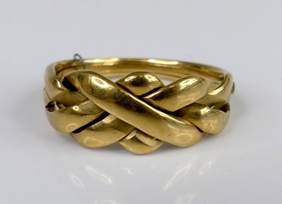 Lot 2736 - A continental 18ct gold Celtic Knot puzzle...