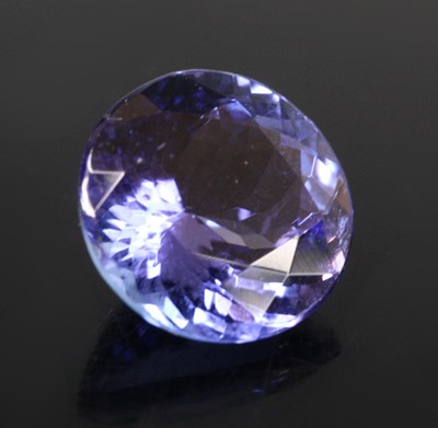 Lot 2742 - A loose round cut tanzanite, with certificate...