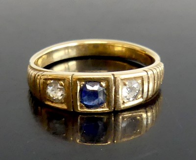 Lot 2600 - A yellow metal, sapphire and diamond...