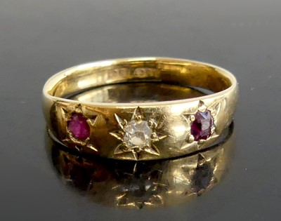 Lot 2601 - A yellow metal, ruby and diamond dress ring,...