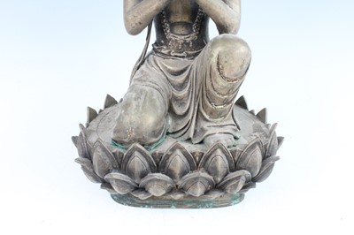 Lot 64 - A large Chinese bronze figure of Buddha on a...