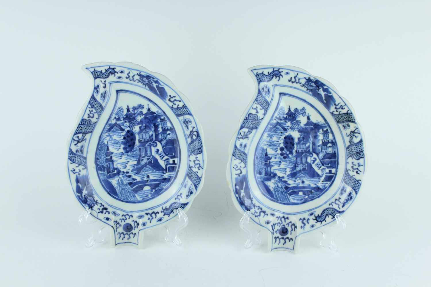 Lot 9 - A pair of Chinese blue and white leaf-shaped...