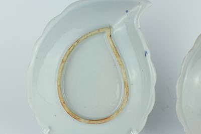 Lot 9 - A pair of Chinese blue and white leaf-shaped...