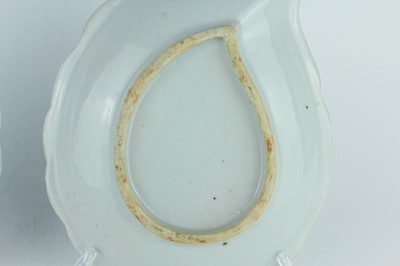 Lot 9 - A pair of Chinese blue and white leaf-shaped...