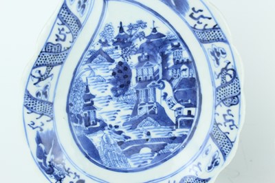 Lot 9 - A pair of Chinese blue and white leaf-shaped...
