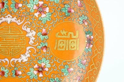 Lot 177 - A Chinese coral-ground famille rose ‘wan shou...