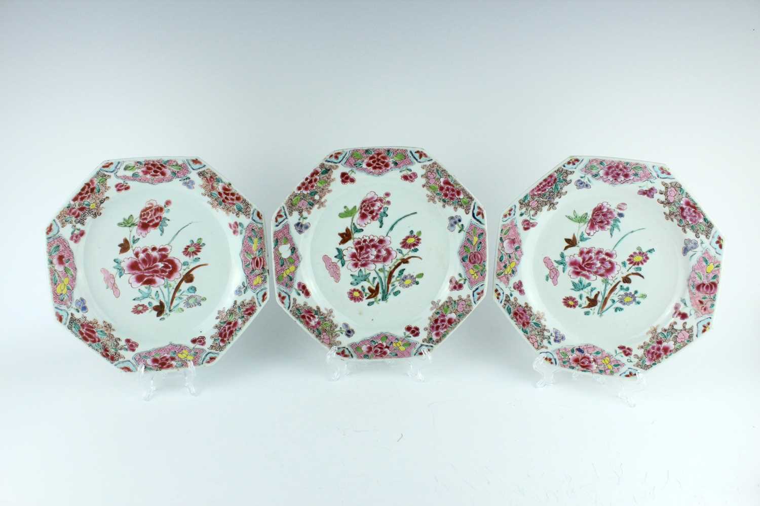 Lot 192 - Three Chinese famille rose octagonal plates,...