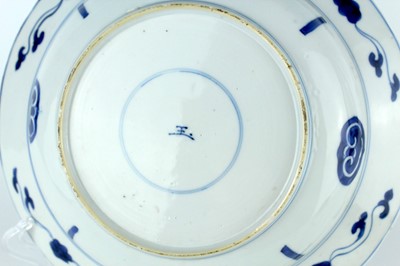 Lot 24 - Three Chinese blue and white dishes, Qing...