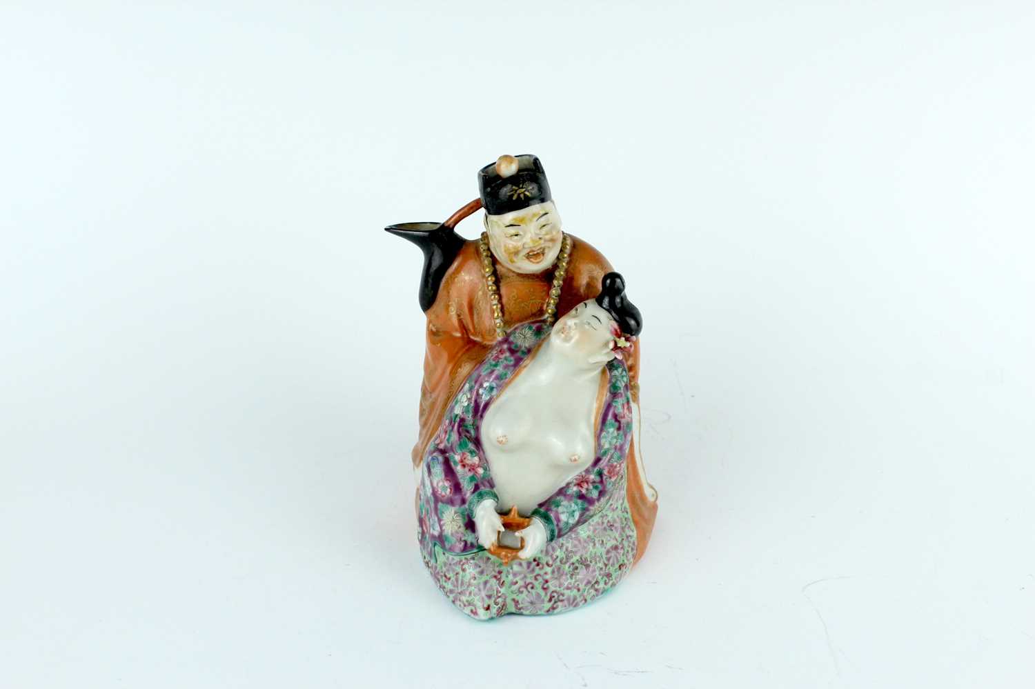 Lot 132 - A Chinese famille rose erotic teapot, late...