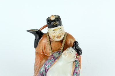 Lot 132 - A Chinese famille rose erotic teapot, late...
