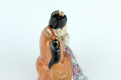 Lot 132 - A Chinese famille rose erotic teapot, late...