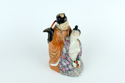 Lot 132 - A Chinese famille rose erotic teapot, late...