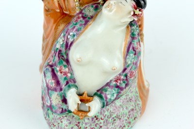Lot 132 - A Chinese famille rose erotic teapot, late...