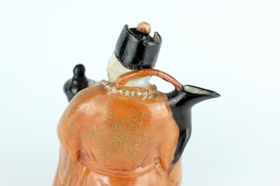 Lot 132 - A Chinese famille rose erotic teapot, late...