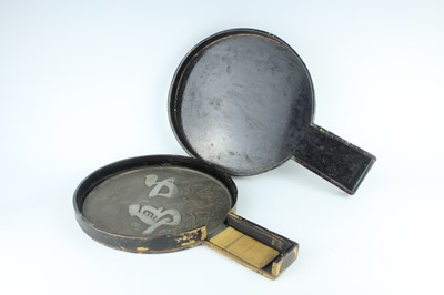 Lot 249 - A Japanese bronze hand mirror, first half of...
