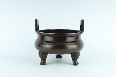 Lot 71 - A large Chinese bronze censer with two handles,...