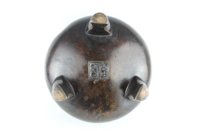 Lot 71 - A large Chinese bronze censer with two handles,...