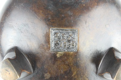 Lot 71 - A large Chinese bronze censer with two handles,...
