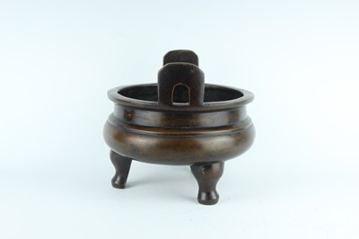 Lot 71 - A large Chinese bronze censer with two handles,...