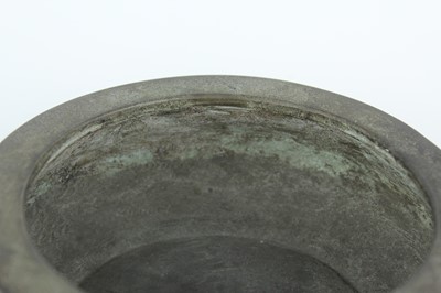 Lot 74 - A Chinese bronze censer with two mask handles,...